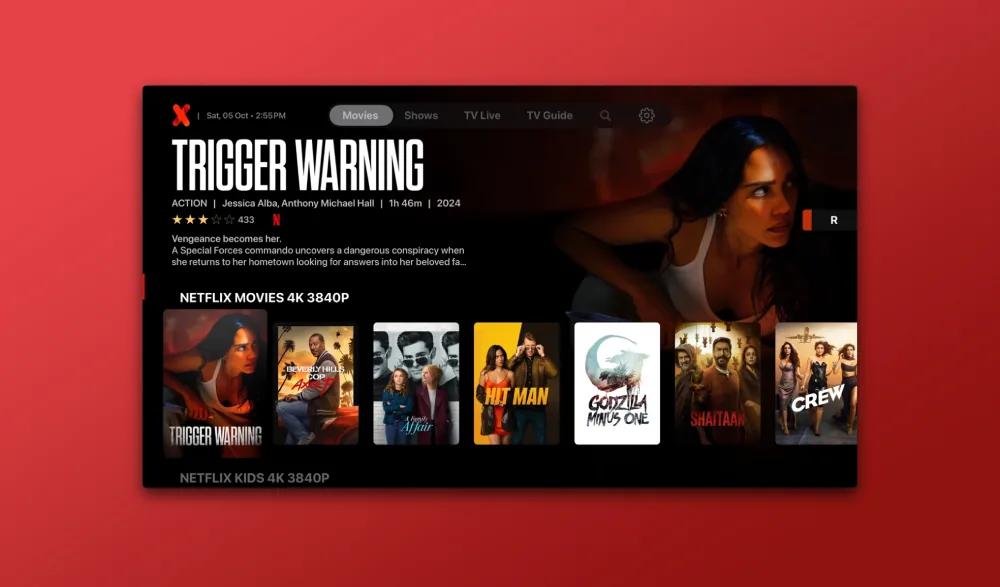 IPTVX-sovellus avattuna Apple TV:llä, ruudulla kanavien, elokuvien ja sarjojen julistenäkymä